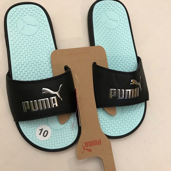 light blue puma slides